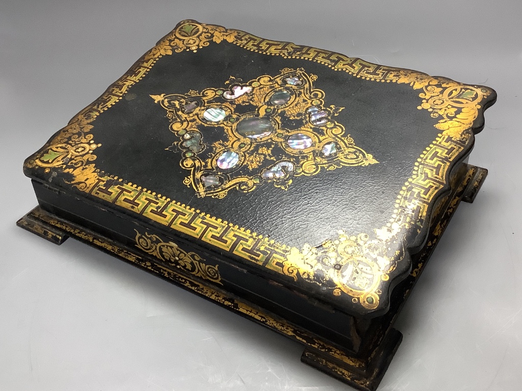 An early 19th century mother of pearl inlaid papier mache stationery box, length 32cm